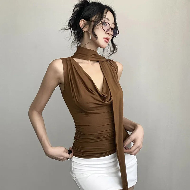 Solid halter-neck pleated camisole with satin ribbon. Sexy V-neck, sleeveless, slim-fit. Perfect for summer office wear.